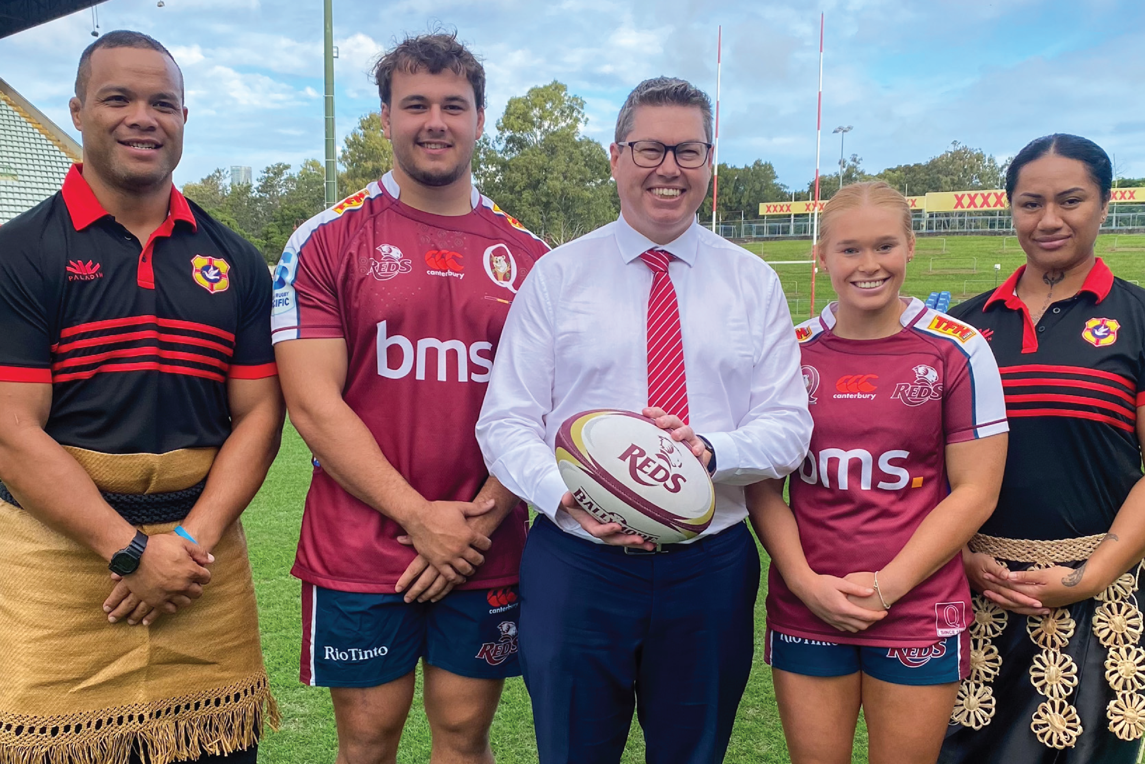 Minister for International Development and the Pacific, the Hon Pat Conroy MP, at Ballymore Stadium announcing the landmark rugby tour of Tonga for the Queensland Reds men's and women's teams with from (left) Tongan women's coach Eddie Aholehei, Reds prop Massimo De Lutiis, Reds halfback Nat Wright and Tongan women's prop Ayla Cook.