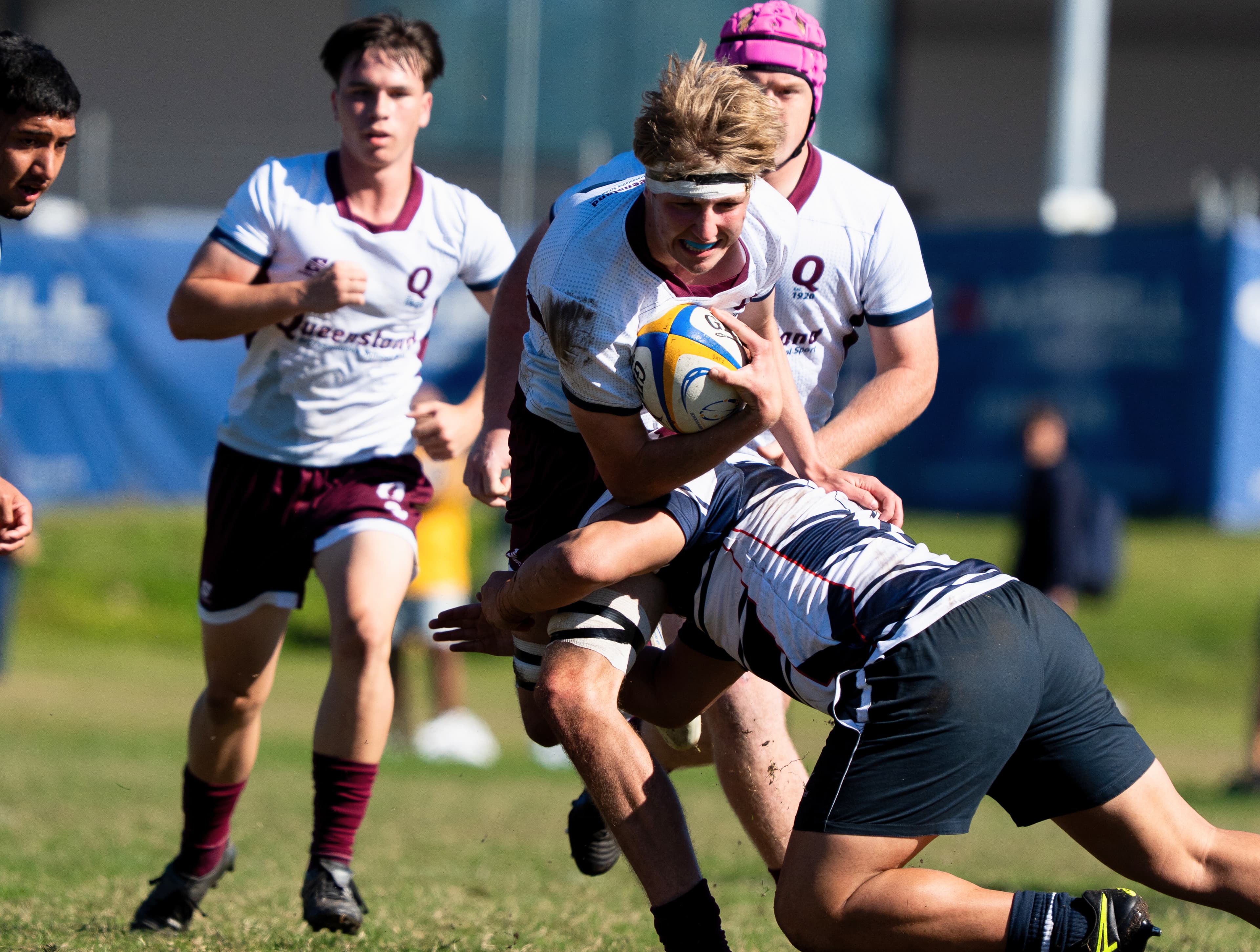Determination...Queensland 2 lock Patrick Lewis, from Nambour's St John's College, carries strongly during the big win over Victoria. Photo: Neha Kumar