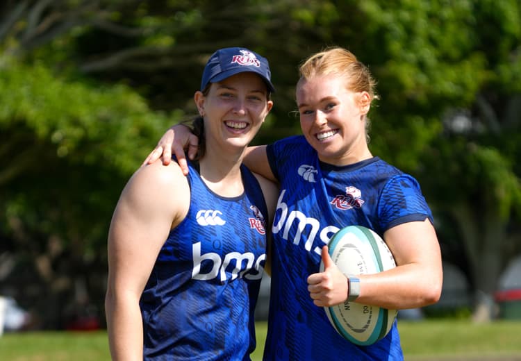 Reds backs Mel Wilks (left) and Nat Wright at training on the Gold Coast. Photo: Neha Kumar