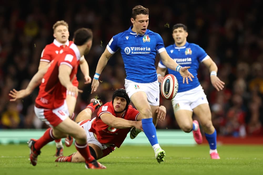 Fly-half Paolo Garbisi was stretchered off in the second half after a heavy collision in their win over Japan.