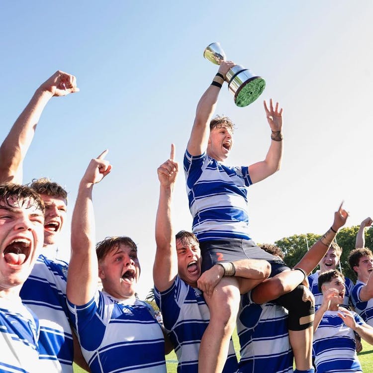 Skipper John Grenfell (with trophy) and Nudgee College teammates celebrate today's First XV rugby premiership. Photo courtesy Nudgee College Facebook